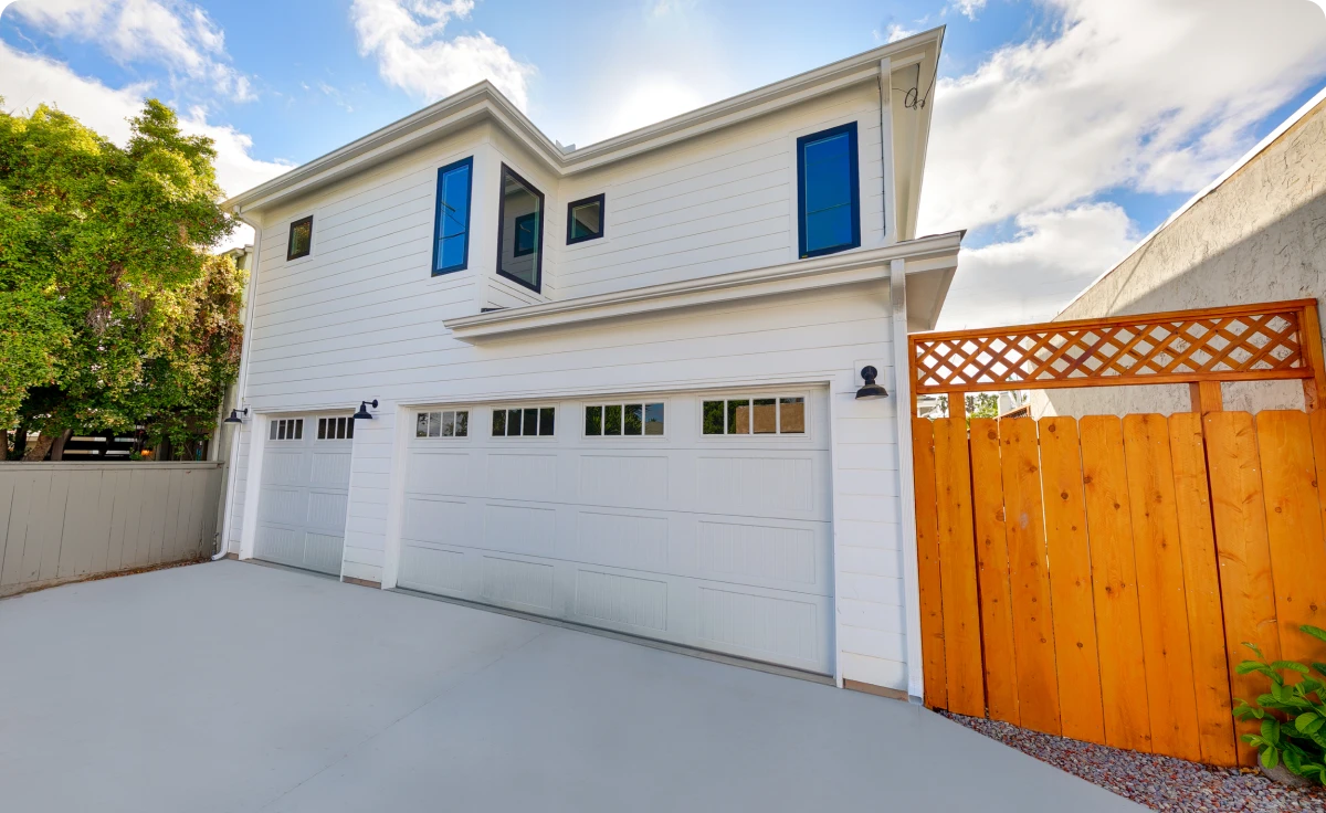 Contemporary home exterior and wooden fence